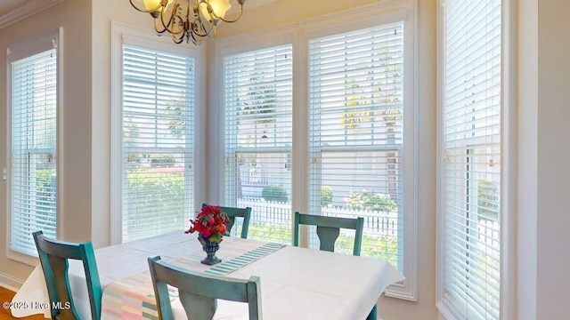 dining area featuring a notable chandelier