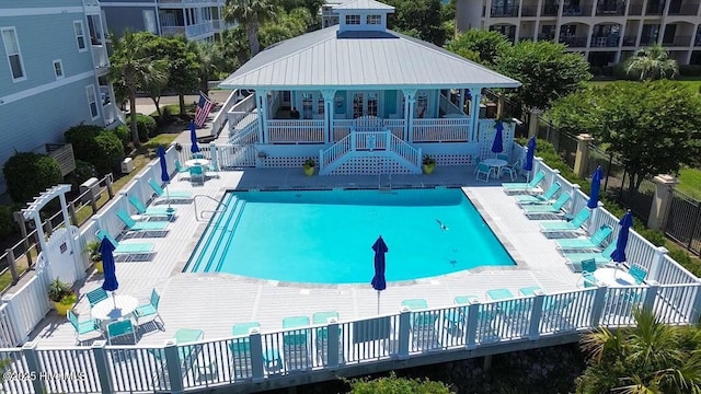 view of swimming pool with a patio