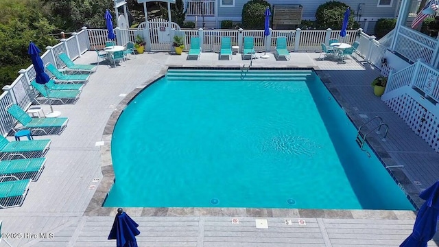 view of swimming pool featuring a patio