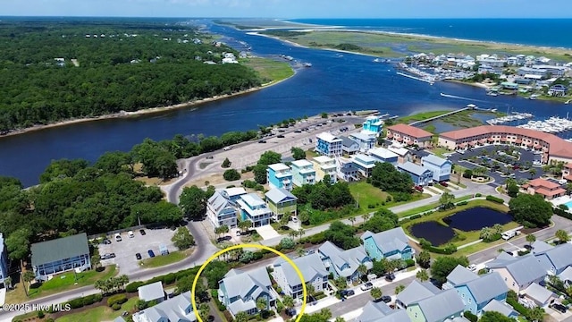 drone / aerial view with a water view