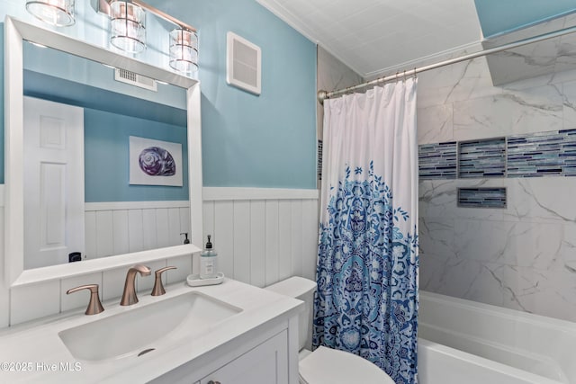 full bathroom with toilet, shower / tub combo, vanity, and ornamental molding