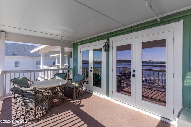 wooden terrace featuring french doors