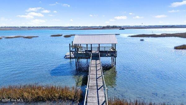 view of dock with a water view