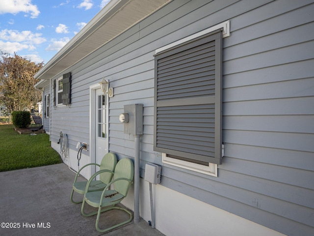 exterior space with a yard and a patio area