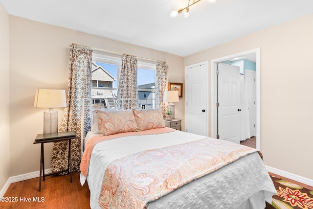 bedroom with hardwood / wood-style floors