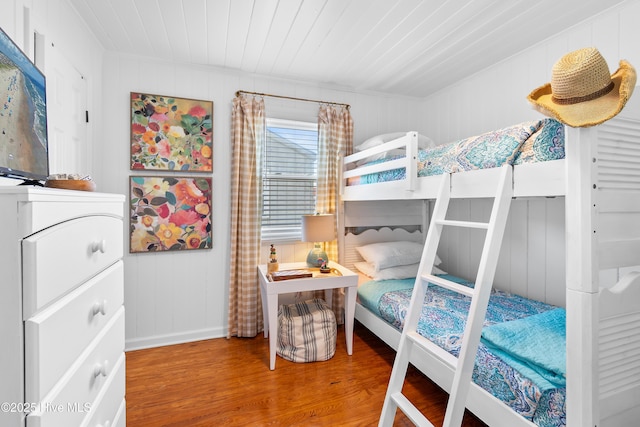 bedroom with hardwood / wood-style flooring