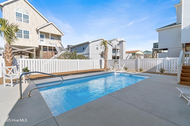 view of pool featuring a patio