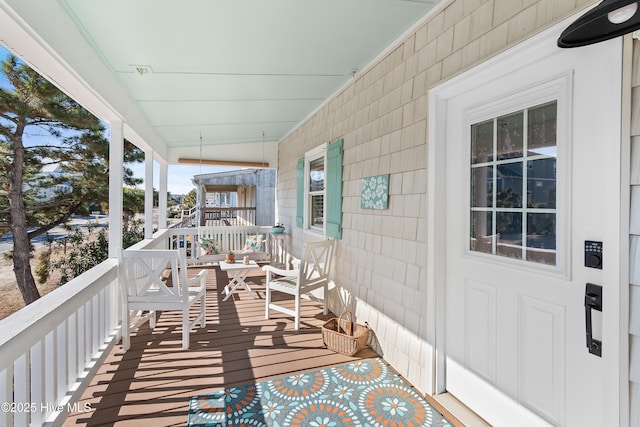 deck with covered porch