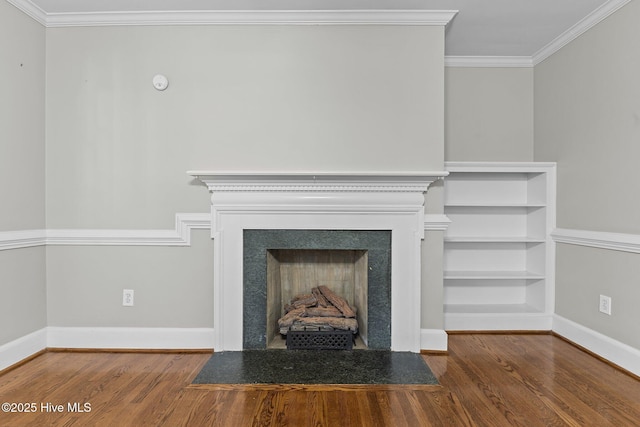 unfurnished living room with hardwood / wood-style flooring and ornamental molding