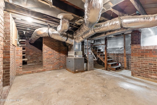 basement with brick wall