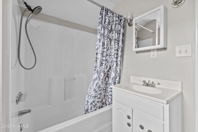 bathroom featuring vanity and shower / bath combo with shower curtain