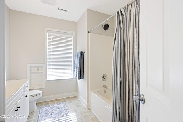 full bathroom featuring toilet, vanity, and shower / bath combination with curtain