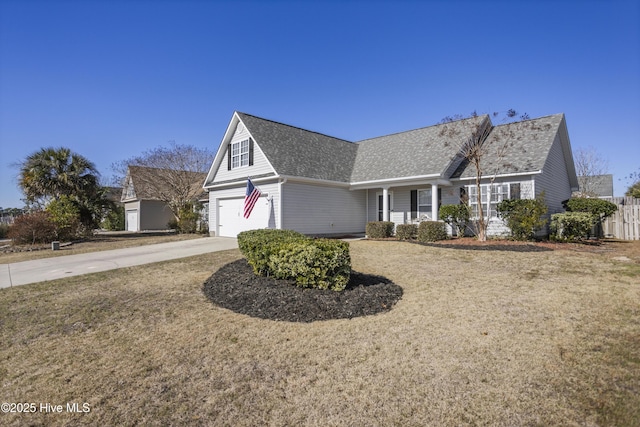 view of front of home featuring concrete driveway, fence, a garage, and roof with shingles