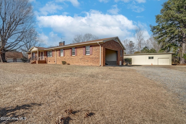 ranch-style home featuring a garage and a porch