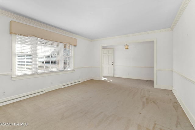 carpeted spare room with crown molding and a baseboard radiator