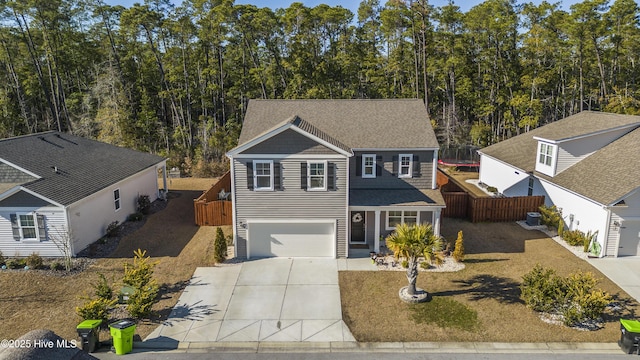 front of property with a garage