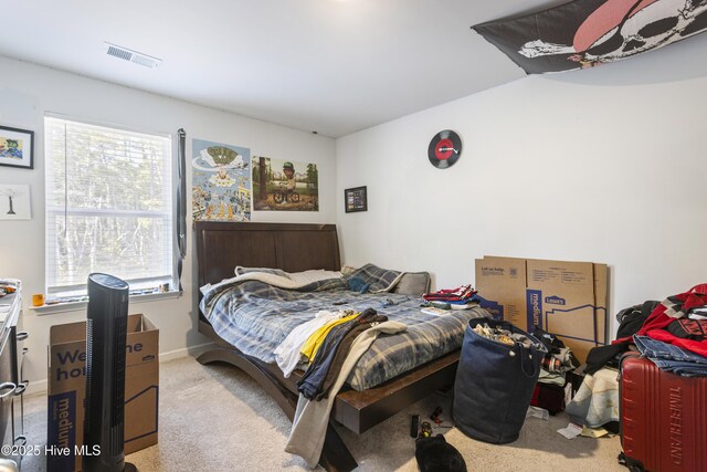 hall featuring carpet floors and washer and dryer