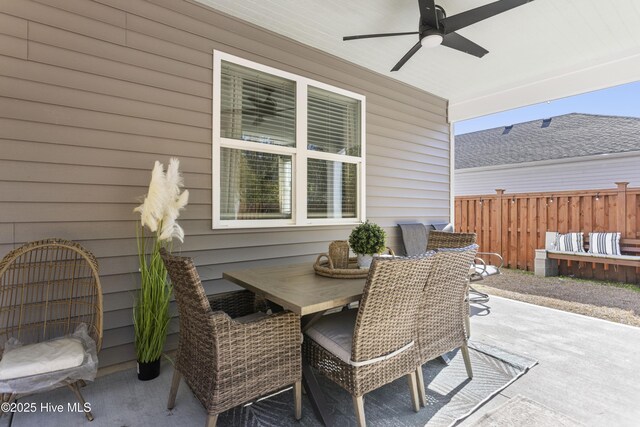 view of patio / terrace featuring ceiling fan and an outdoor living space