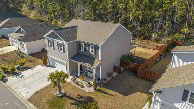 back of house with a patio