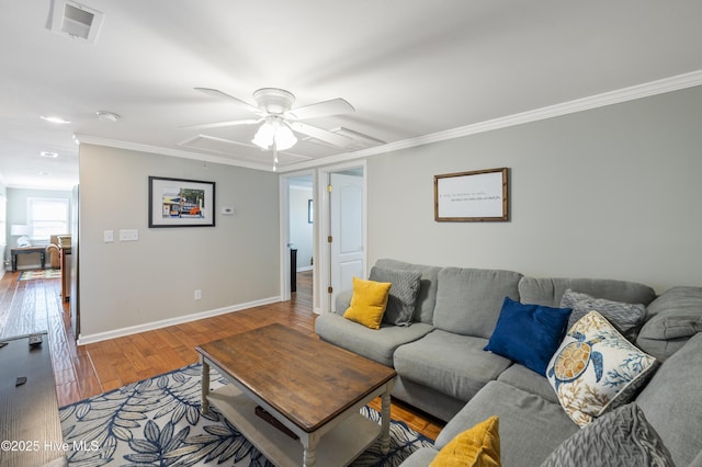 living room with ceiling fan, hardwood / wood-style floors, and crown molding