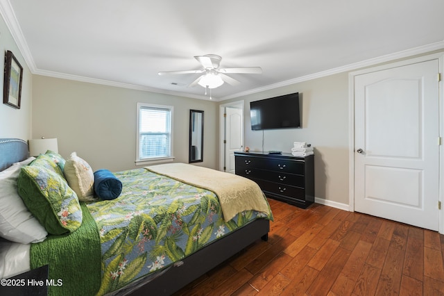 bedroom with ceiling fan, dark wood-type flooring, and crown molding