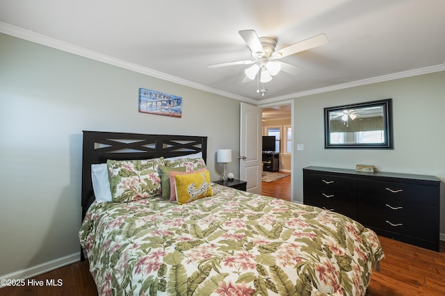 bedroom with ceiling fan, dark wood-type flooring, and crown molding