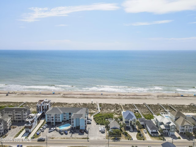 aerial view with a view of the beach and a water view