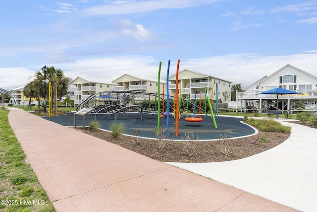 view of home's community with a playground