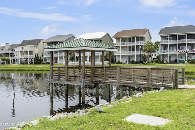 view of dock featuring a water view and a gazebo