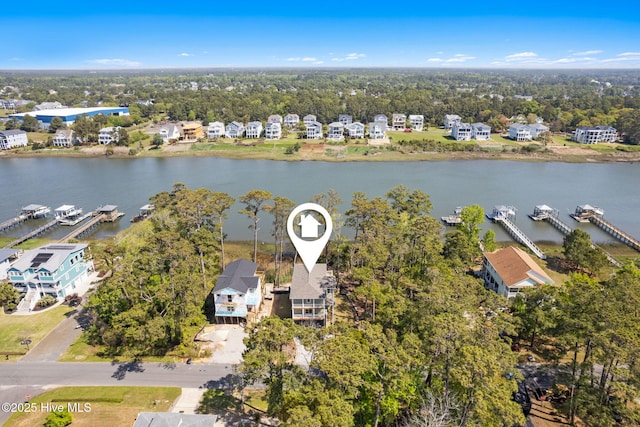 drone / aerial view with a water view