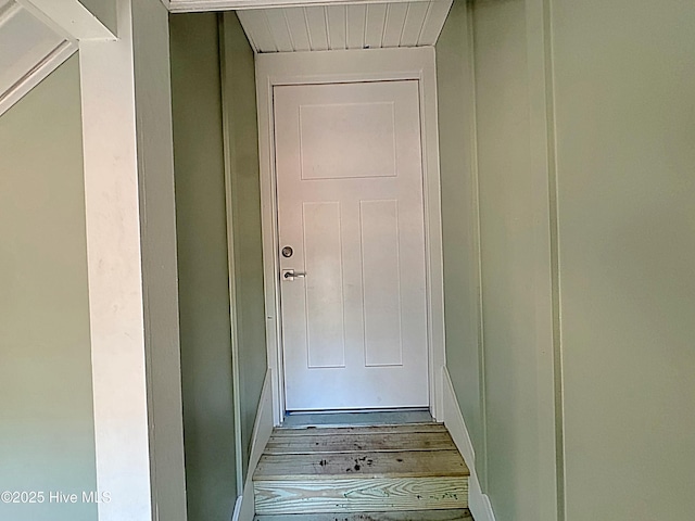 doorway featuring wood finished floors