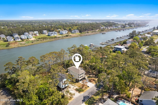 birds eye view of property featuring a water view