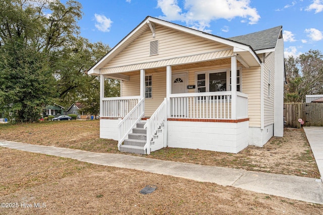 bungalow-style home featuring covered porch