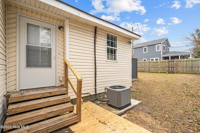 entrance to property featuring central AC