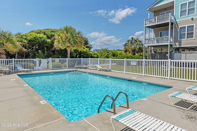 view of pool featuring a patio area