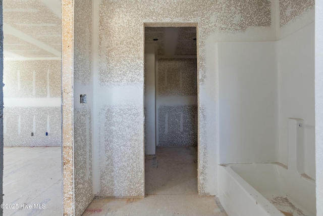 bathroom with a tub