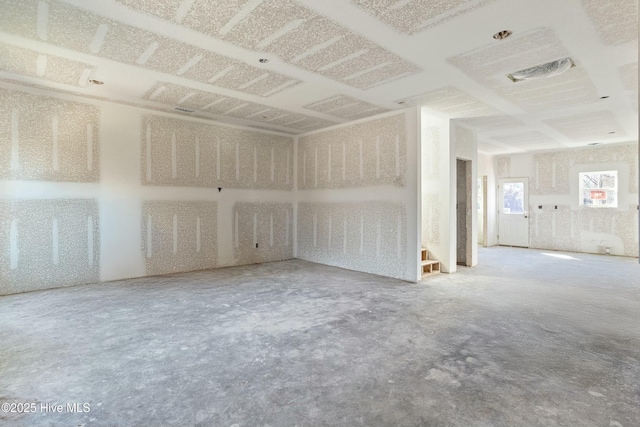 spare room with concrete flooring