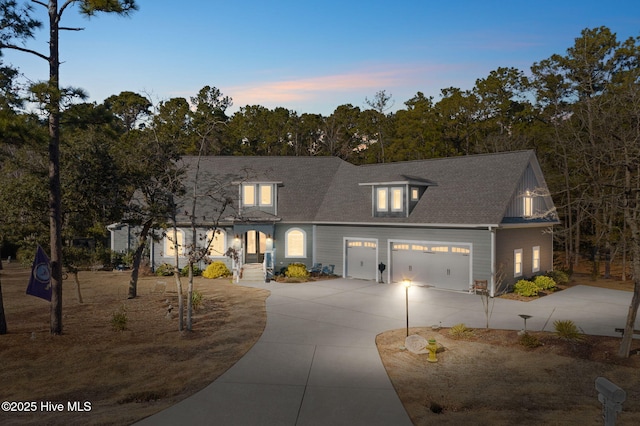 view of front of property with a garage