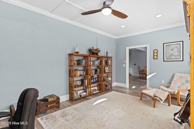 sitting room featuring crown molding, ceiling fan, and hardwood / wood-style floors