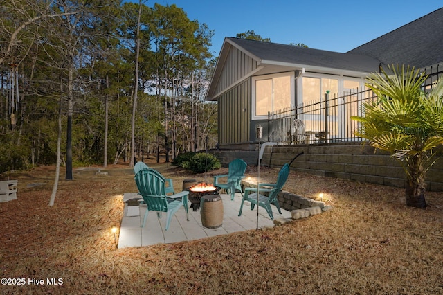 view of patio / terrace featuring an outdoor fire pit