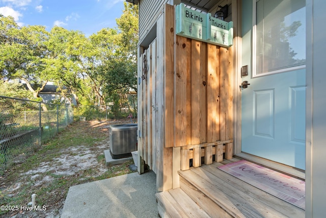 doorway to property with central air condition unit