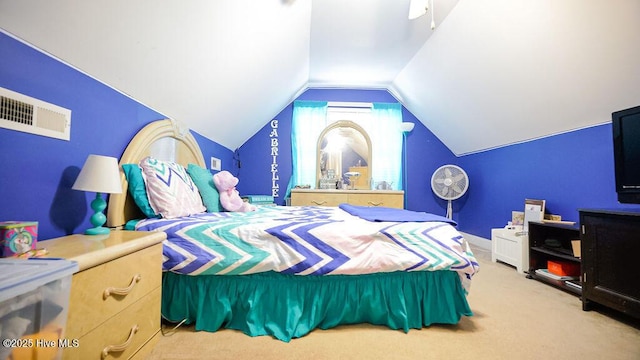 bedroom with carpet flooring, vaulted ceiling, and visible vents