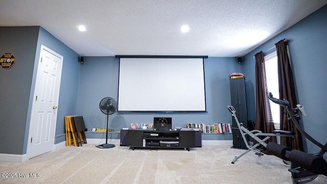 cinema room featuring carpet floors, recessed lighting, a textured ceiling, and baseboards