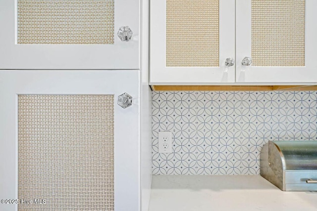 interior space featuring backsplash