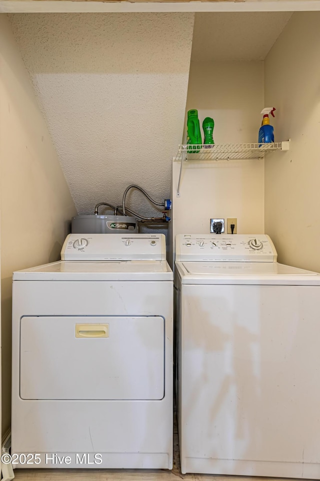 laundry area with separate washer and dryer