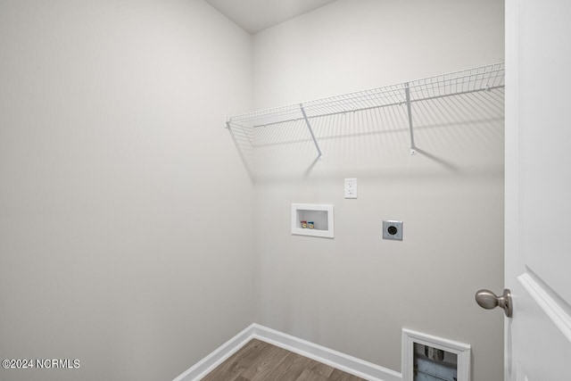 laundry area featuring washer hookup, electric dryer hookup, and hardwood / wood-style flooring