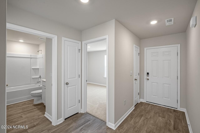 hall featuring hardwood / wood-style flooring