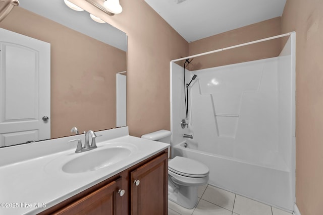 full bathroom with tile patterned floors, vanity, toilet, and shower / washtub combination