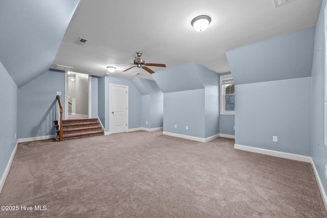 bonus room featuring carpet floors, lofted ceiling, and ceiling fan