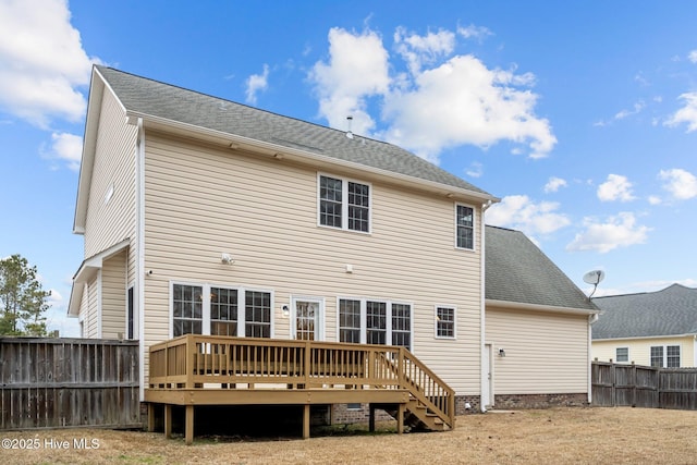 rear view of house with a deck